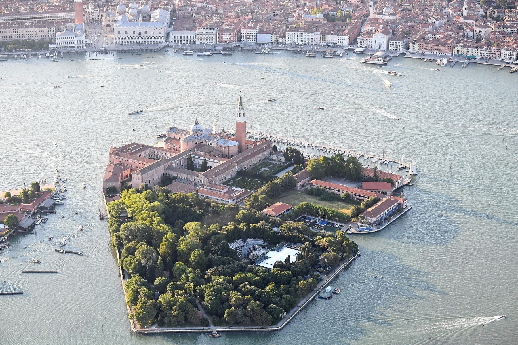 Aerial views of San Giorgio Maggiore Island in Venice, Italy, the stunning venue for the wedding of Jeff Bezos and Lauren Sánchez. Nestled in the Venetian lagoon, this historic island is home to the 16th-century San Giorgio Maggiore church, designed by renowned architect Andrea Palladio